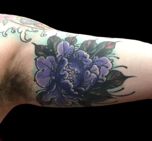 Arm Flowers Tattoo