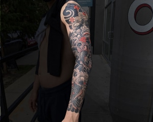 Arm Black & Grey Blackwork Japanese Koi Sleeve Tattoo